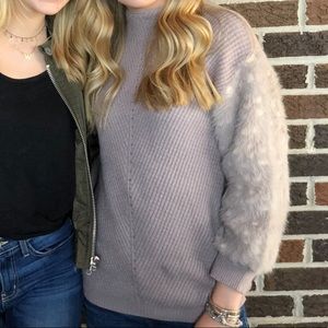 Sweater with fur sleeves